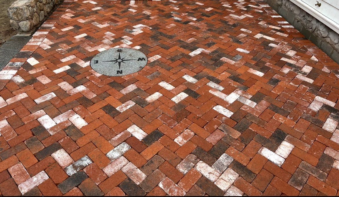 Enchanting Brick Patio with Granite Compass image